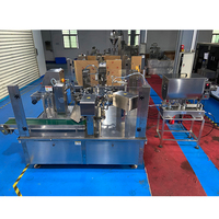 Emballage rotatif multifonctionnel pour sacs debout Sachets de jus de mangue et de raisin Machine d'emballage de sacs de forme spéciale doypack
