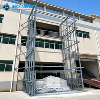 Petit élévateur hydraulique à quatre poteaux pour entrepôt en mezzanine, monte-charge vertical, plateforme élévatrice industrielle robuste sur mesure