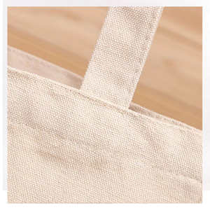 Environmentally friendly and reusable designer <b>fabric</b> canvas cotton shopping <b>bag</b> with custom logo printed on it - Product Image 2