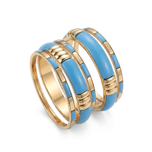 Elegante brazalete de resina azul cielo con detalles en tono dorado, hecho a mano para uso diario, festivo y para fiestas. - Product Image 1
