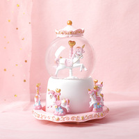 Mignonne boîte à musique en résine avec globe à neige rotatif, lumière LED, boule de cristal, design licorne et flocon de neige, décoration de bureau, cadeau d'anniversaire