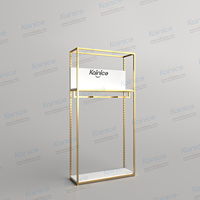 Kainice Costume élégant personnalisé populaire Présentoir de vêtements en or Présentoir de magasin Cintre suspendu au sol Design d'intérieur