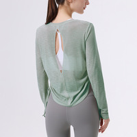 Blouse de sport pour femme en polyester 100% respirant, micro-transparente, dos creux, à lacets, à manches longues, pour le yoga