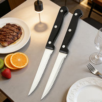 Couteau à steak dentelé Offre Spéciale avec manche en PP noir Couteau de table en acier inoxydable Couteau à steak durable en métal