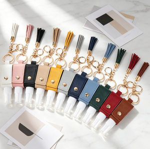 Porte-clés pendentif personnalisé en cuir PU avec pompon, nouveau modèle, pour flacon de désinfectant pour les mains portable, vente en gros sur mesure - Product Image 3