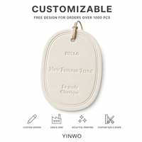 Étiquette de vêtement personnalisée en gros, gaufrée, forme ovale, logo personnalisé, forme sur mesure, OEM