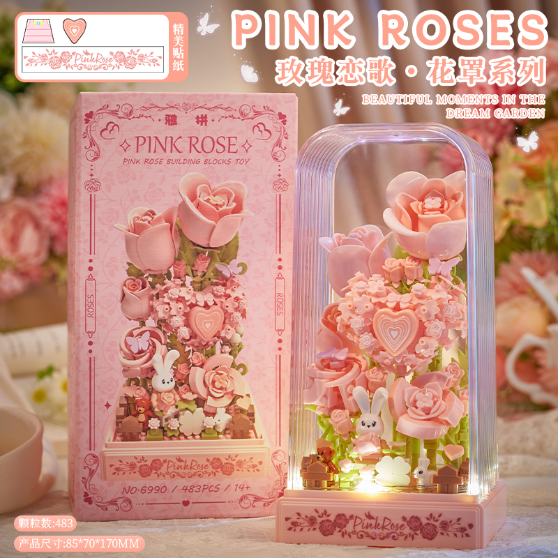 Guirlande lumineuse en forme de cœur avec mini-lapins et roses.