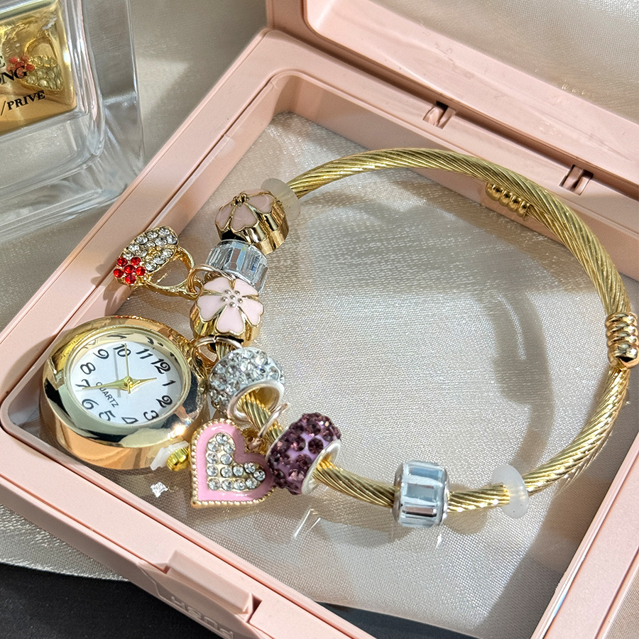 Bracelet fleurs de cerisier en forme de coeur doré