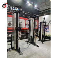 Nouvel équipement de gymnastique de forme physique entraîneur multifonctionnel Smith Machine Station d'entraînement double poulie réglable Machine à câble