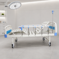 Lit d'hôpital à cadre tubulaire en acier 40x80, avec barrière latérale en alliage d'aluminium et roulettes double face, pour usage en clinique et soins infirmiers