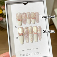 OEM ODM Vente en gros Faux ongles à presser réutilisables, style élégant, peints à la main, blanc laiteux, motif pois français, rose, or, effet œil de chat cristal, en ABS, CE
