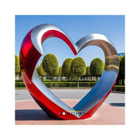 Pelouse grand décor en acier inoxydable nouveau design art coeur rouge sculpture à vendre