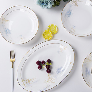 ชุดอาหารค่ำพอร์ซเลนเนื้อกระดูกเคลือบทองคำคุณภาพสูง ชุดเครื่องถ้วยชามเซรามิกสุดหรูสำหรับงานเลี้ยง คุณภาพสูง ทนทาน - Product Image 4