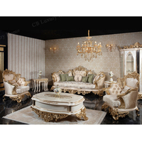 Ensemble de canapés turcs de luxe, canapés en tissu doré, fauteuil sculpté en bois, table basse en marbre blanc haut de gamme, table d'appoint