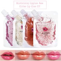 Base de gloss à lèvres transparente hydratante brillante imperméable avec logo personnalisé du fournisseur OEM, formule liquide minérale végétalienne multi-couleurs pour des lèvres pulpeuses