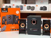 Altavoces estéreo Kisonli C80 de 2.1 canales y 5W con soporte para tarjeta de memoria, pantalla LCD, control remoto, conexión por cable y carcasa de plástico.