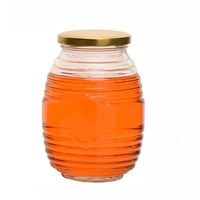 Pots en verre de forme claire vide de nid d'abeilles de catégorie comestible pour le miel avec des couvercles en métal