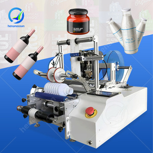 Etiqueteuse semi-automatique manuelle à colle humide double face OCEAN, pour toutes formes de bouteilles, avec code - Product Image 1