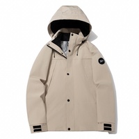 Veste de randonnée d'hiver à capuche personnalisée, col montant, poches latérales zippées, longueur mi-longue, 3 en 1, hardshell, pour l'extérieur, avec logo
