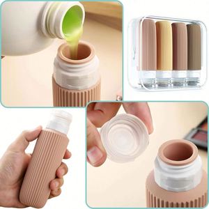 Ensemble de flacons de voyage 4 en 1 rechargeables de qualité alimentaire avec logo personnalisé, flacons de gel douche, shampoing et articles de toilette portables et compressibles - Product Image 2