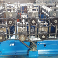 Machine de formage à froid de tôles métalliques à double couche pour tôles ondulées et tôles de toiture IBR