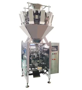 Automatic nuts granule pistachio filling weighing flowing packing pillow bag candy packaging machine