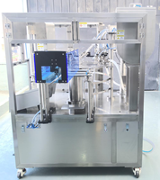 Machine automatique de remplissage et de bouchage de sachets à double bec verseur pour liquides, pâtes, cosmétiques, lotions et savons