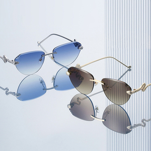 Lunettes de soleil œil-de-chat sans monture élégantes pour femmes, avec embellissement en métal en forme de <span class=keywords><strong>serpent</strong></span>, protection UV400, verres haute définition - Product Image 2