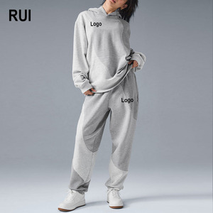 RUIQUWIN, venta al por mayor, conjunto de ropa deportiva de 2 piezas de alta calidad para mujer, pantalones de chándal con capucha de retazos, traje de entrenamiento suelto, chándal informal - Product Image 1