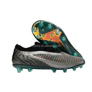 Botas de fútbol FG/TF al por mayor OEM/ODM para adultos y jóvenes, con opciones antideslizantes, ligeras y transpirables de tejido. - Product Image 3