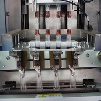 Machine automatique de remplissage et de scellage de sachets pour l'emballage de boissons, jus, lait et liquides en sachet/pochette