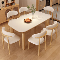 Meubles de salle à manger design moderne d'usine Mobilier de chambre Table à manger en marbre Ensemble de chaises de luxe avec Bsae en bois massif