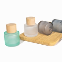 Flacon de parfum cylindrique 30ml 50ml 100ml en verre transparent avec impression sérigraphique, emballage cosmétique rechargeable, pulvérisateur à embout de 15mm