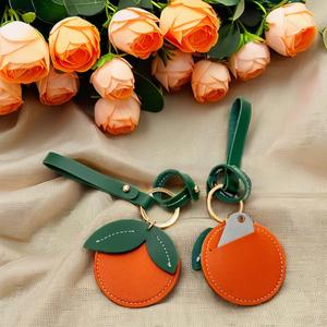 <b>Cute</b> Orange PU Leather Light Keychain with Embossed Design-Durable Backpack <b>Purse</b> Charm for Birthday & Wedding - Product Image 2