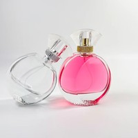 Flacon de parfum en verre épais rond personnalisé de 30 ml, 50 ml, 100 ml avec bouchon noir, pompe à pression anti-fuite, impression sérigraphique