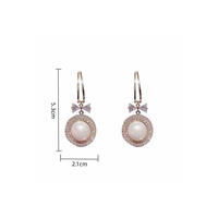 Pendientes de perlas de imitación con lazo de temperamento para mujer, nicho redondo de moda y versátil y pendientes personalizados al por mayor