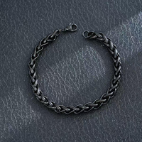Vente en gros de bracelet en acier titane tendance hip-hop, chaîne cubaine, chaîne torsadée, fermoir à homard, bracelet noir NK pour homme
