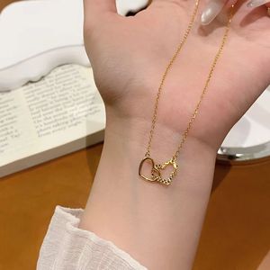 Collier pendentif double cœur en or 18 carats Xinfly, bijoux élégants et raffinés, cadeau idéal pour la Saint-Valentin, un anniversaire, en promotion - Product Image 1