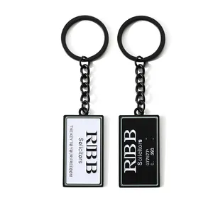 Factory custom metal logo metal black and white soft enamel keychain