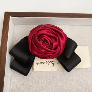 Arco negro Rosa flor pato pico clips niñas moda temperamento horquillas pinzas para el cabello