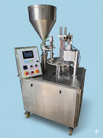 Machine de remplissage et de scellage semi-automatique à 4 stations pour lassi, curd, shrikhand, yaourt et produits laitiers – Haute efficacité pour l'emballage en gobelets