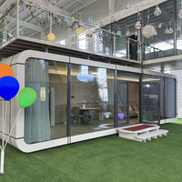 Cabine préfabriquée mobile d'extérieur en acier galvanisé, design inspiré de l'Apple, avec panneaux sandwich, pour écoles, bureaux, kiosques et maisons.