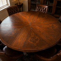 Table à manger ronde extensible de style américain avec marqueterie en bois incrusté, bordure sculptée et base tournée