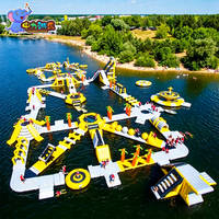 Parc aquatique gonflable commercial robuste en PVC de 0,9 mm, parcours d'obstacles aquatiques scellé, flottant sur l'eau de mer