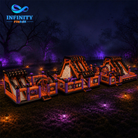 Parc d'attractions gonflable commercial d'Halloween avec maison hantée, toboggan multi-voies et parcours d'obstacles pour enfants