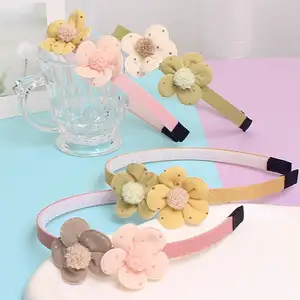 Factory wholesale new children's hair accessories Korean version of the fabric sweet and lovely flowers non-slip headband