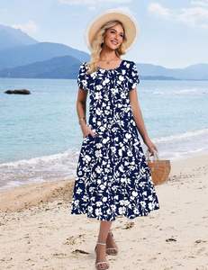 Robe longue tropicale à fleurs pour femmes à manches courtes, idéale pour les vacances à la plage au quotidien. Fabriqué en tissu climatisé. - Product Image 6