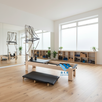Prix d'usine : Reformer Pilates en bois d'érable avec tour intégrée et barre de repose-pieds pour exercices de musculation, gym, yoga, Pilates