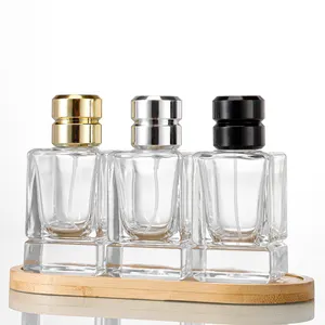 Nouveau flacon de parfum carré vide haut de gamme de 50ml avec spray or et argent