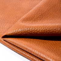 Cuir synthétique gaufré imperméable en PVC noir élastique pour sièges de voiture, chaises, canapés, sacs et meubles